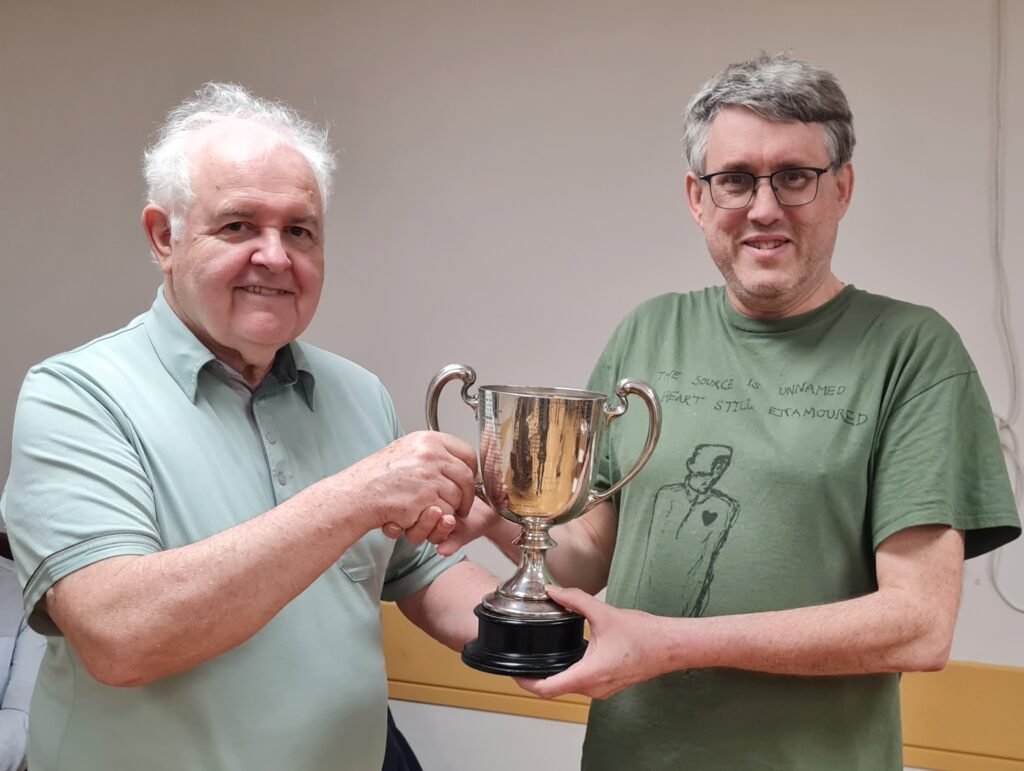 John Foley receiving the Alexander Cup from Graham Alcock